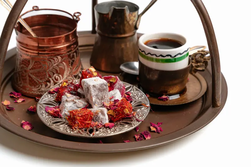 Coffee and lokum on a metal tray