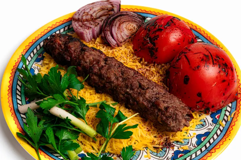 Beef kabob over yellow rice