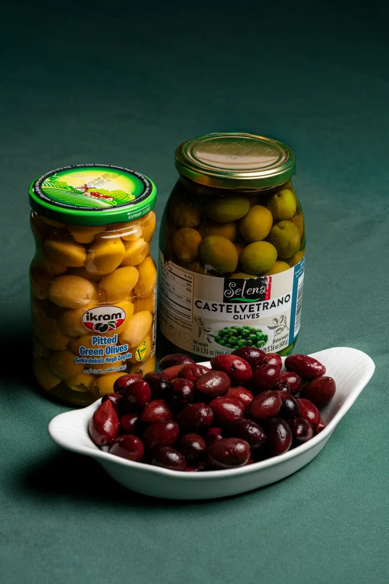 Jars of green and Kalamata olives